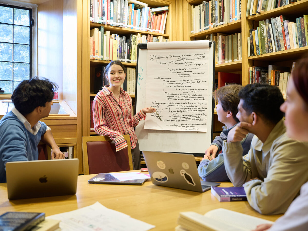 Students in a tutorial in the library