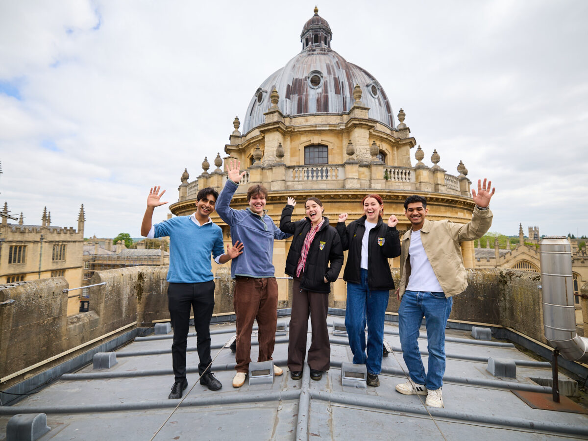 Students on the roof in front of the Radcliffe Camera