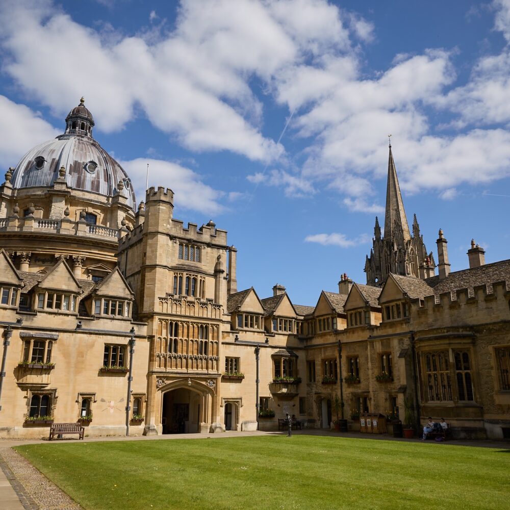 Brasenose quad in the sun with Radcliffe Camera in the background