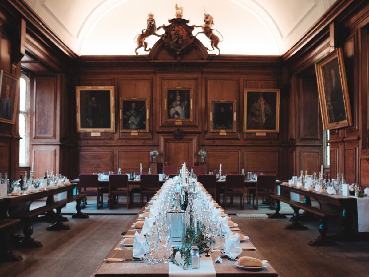 Formal dinner set up in a college dining hall