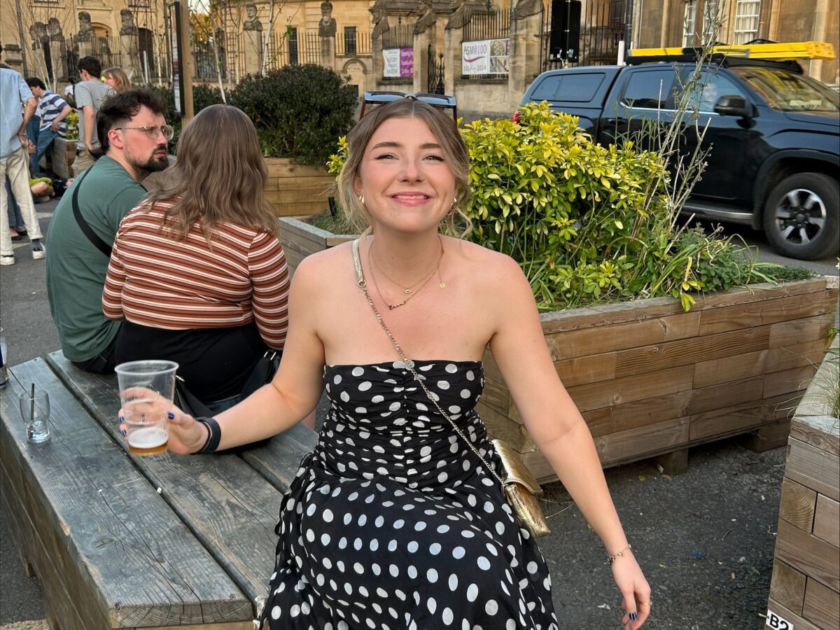 Student blogger Erin Bridgewater sat on a bench