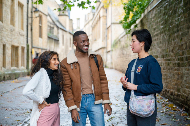 Students chatting on Brasenose Lane, Oxford