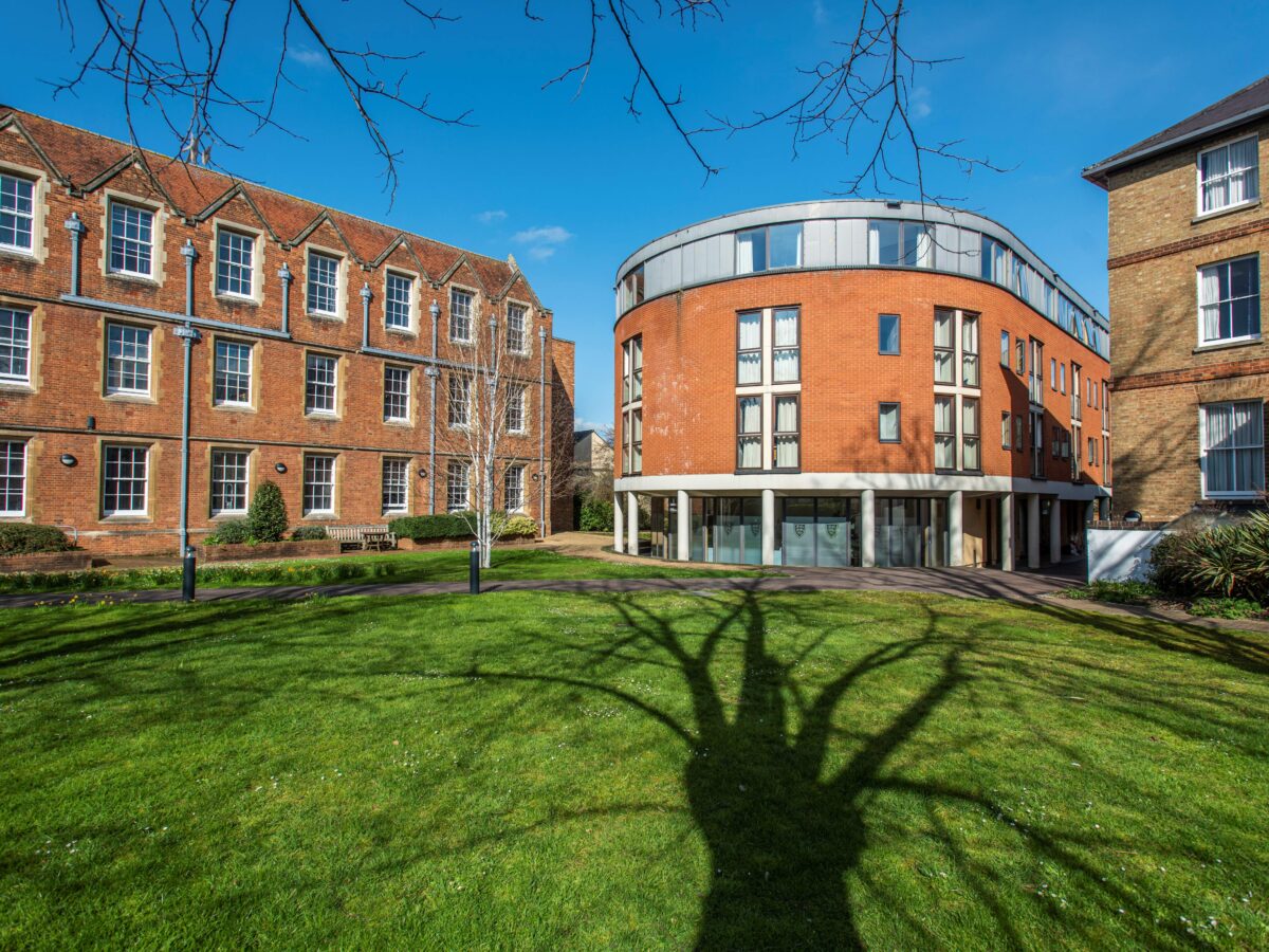 Exterior view of modern college accommodation buildings on a lawn