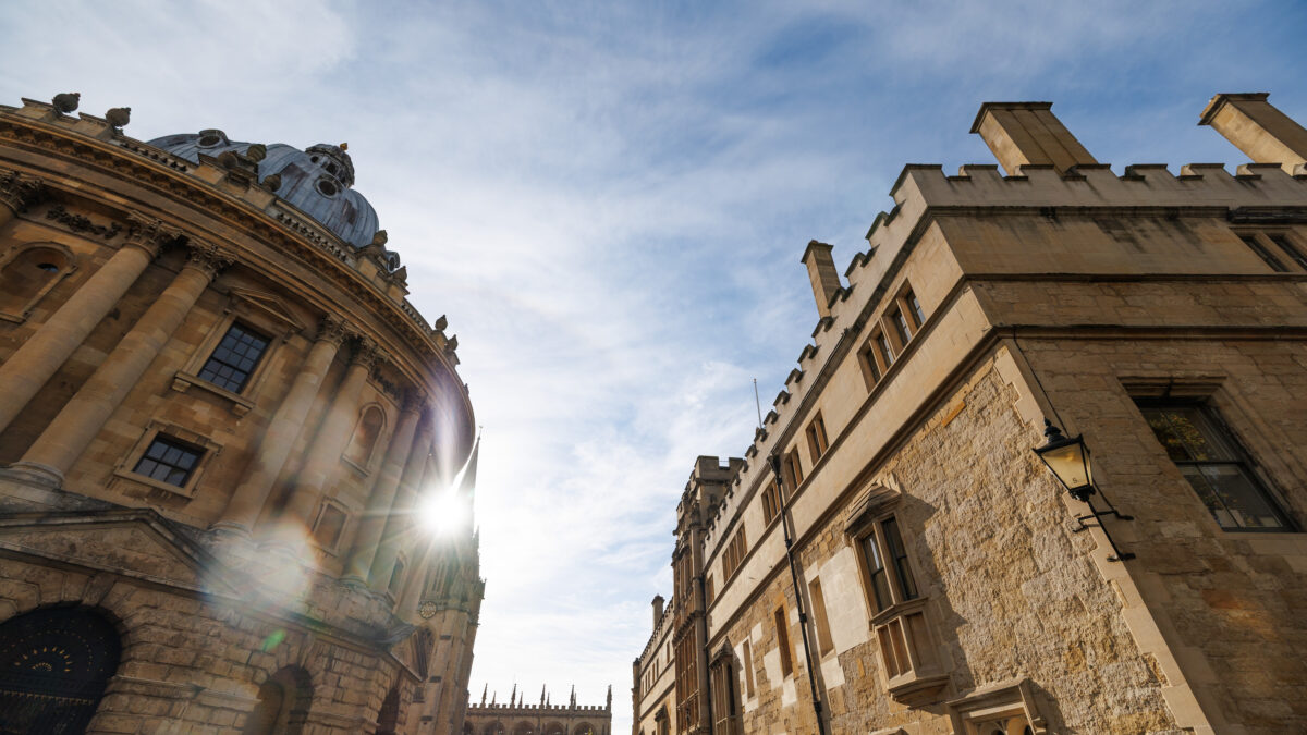 View of historic college buildings. The Radcliffe Camera on the left and Brasenose College to the right