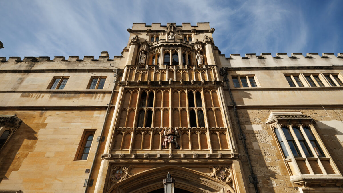 Tall stone entrance of a Brasenose College viewed from below