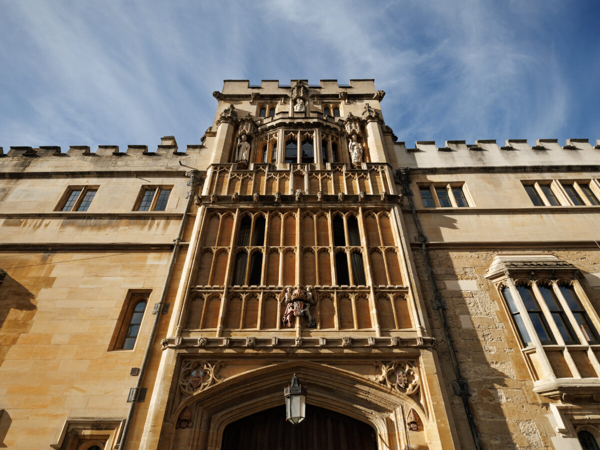 Tall stone entrance of a Brasenose College viewed from below