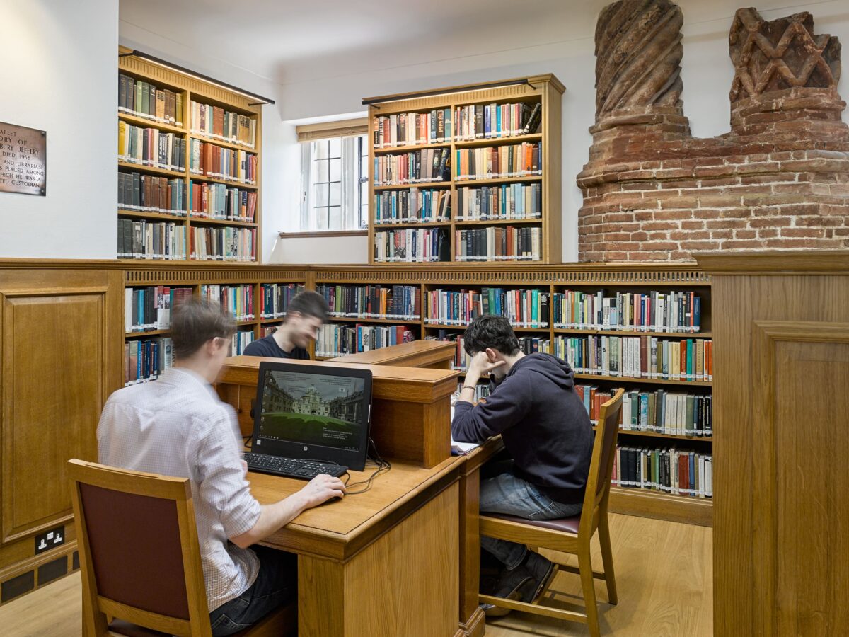 Students sitting at desks studying in the History Library