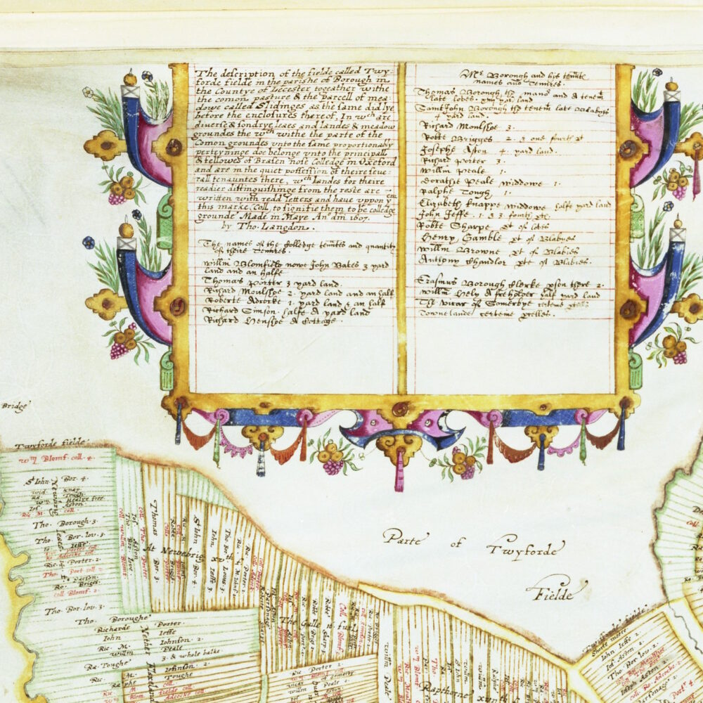 Open illuminated manuscript page with decorative borders