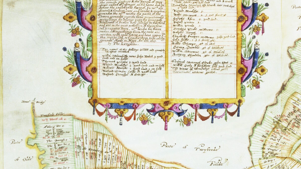 Open illuminated manuscript page with decorative borders
