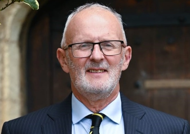 Head and shoulders photograph of Principle John Bowers