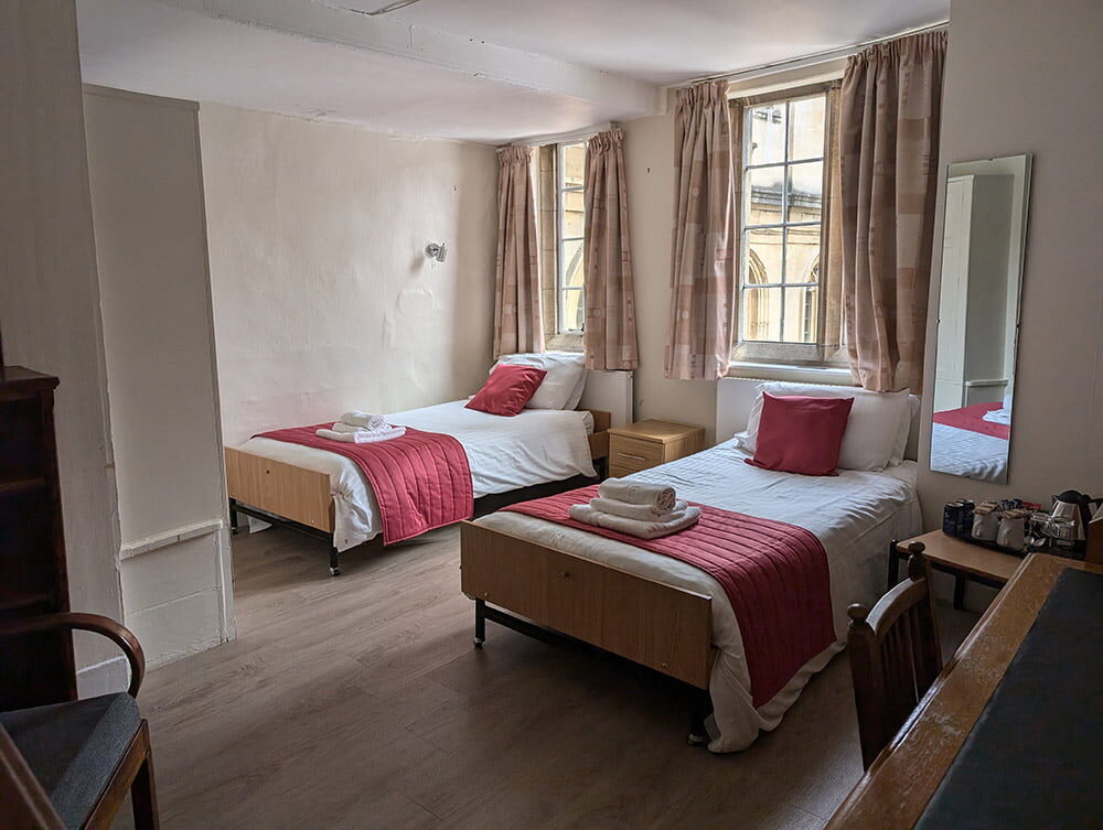 A twin room in our historic main site.