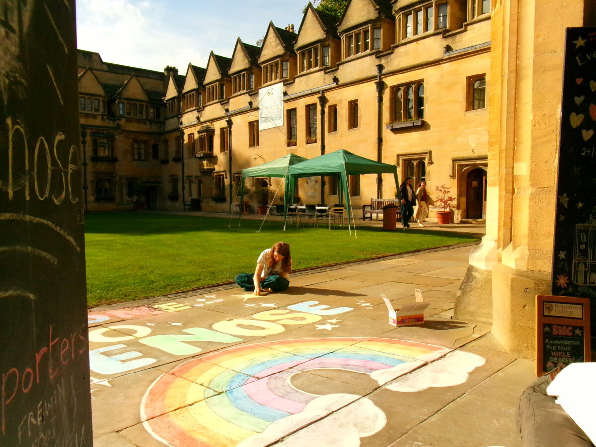 Picture of student painting on the quad at 2025 open day